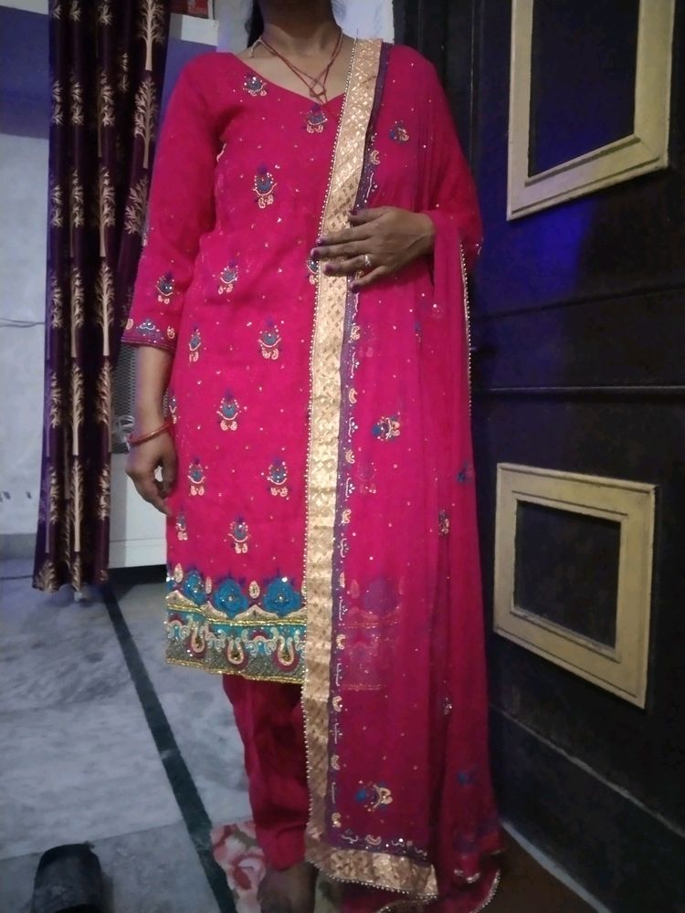 A Megenta Colour Punjabi  Bridle Suit