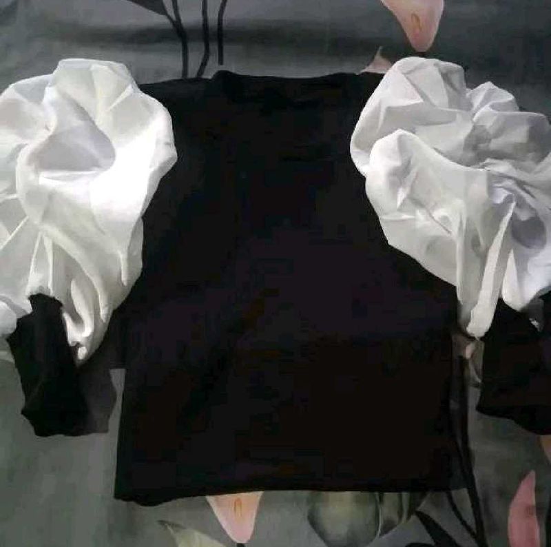 Chic Black Top with Dramatic Puffy Sleeves