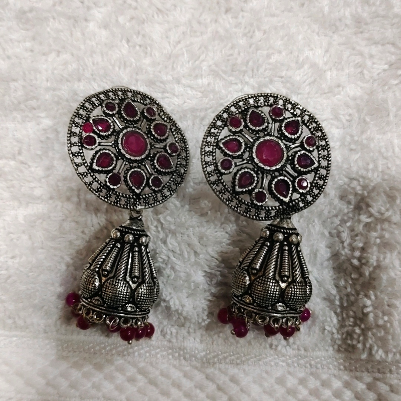 Silver look alike earing with Ruby stone