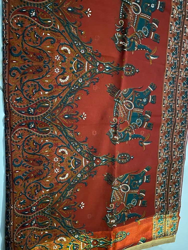 Elegant Red Saree with Elephant Print