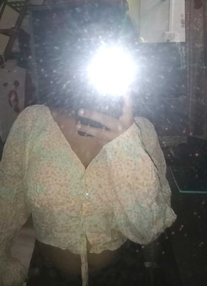 long-sleeve cropped blouse with a tie-front