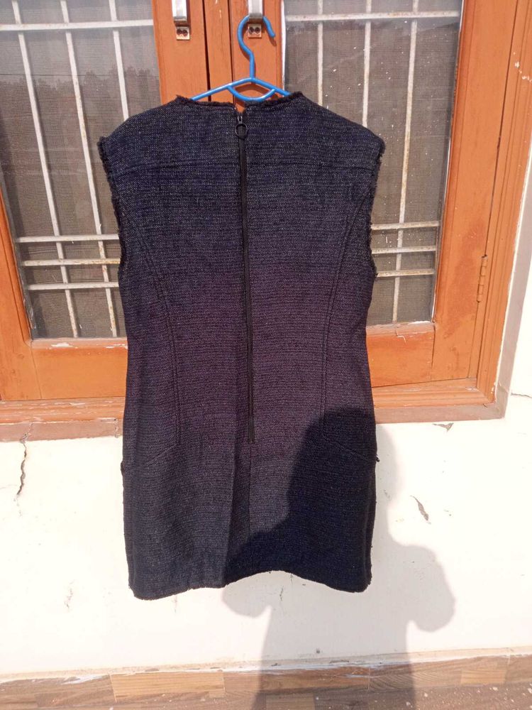 Sleeveless Textured Sheath Dress