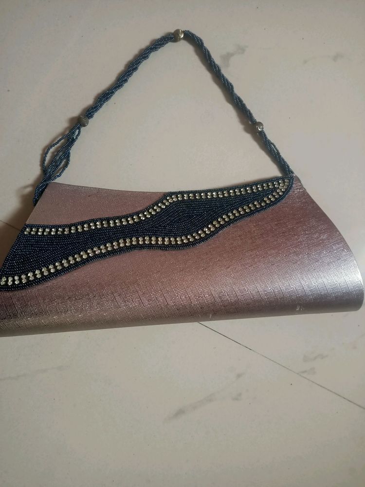 beautiful clutch it suits in any outfit.