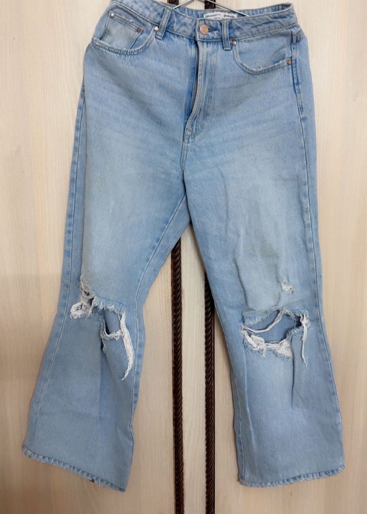 Ripped Light Wash Denim Jeans