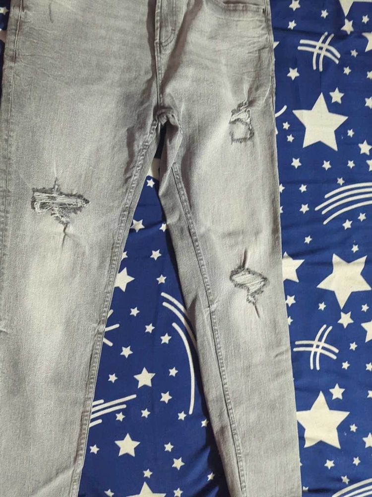 Ripped Grey Jeans