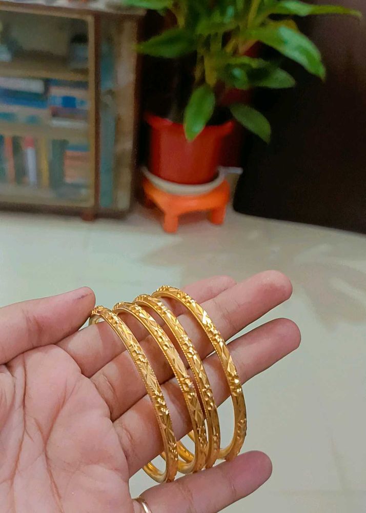 Set of Four Gold Bangles