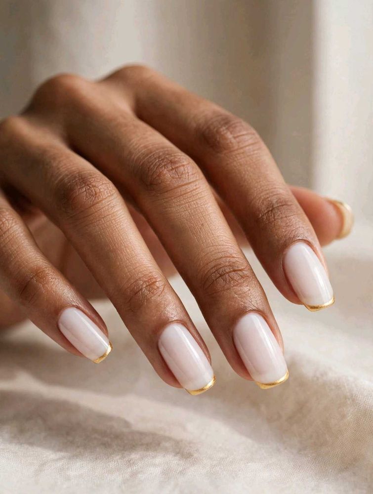 Chic French Manicure with Gold Tips