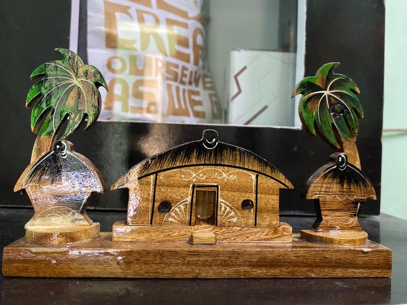 It Is A House With Huts And Trees. It Is Handmade Made With Love And Care.