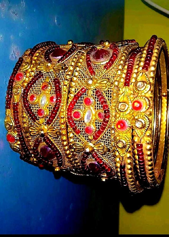 Elegant Gold and Ruby Bangle