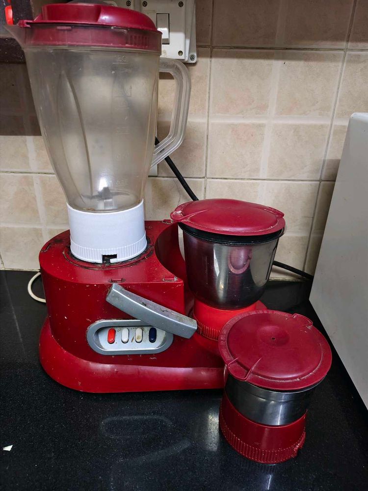 Red Mixer Grinder with Multiple Jars