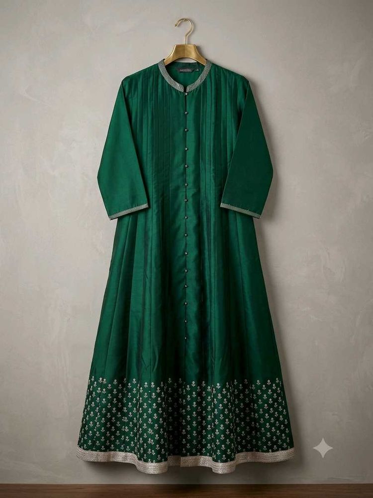 Elegant Green Gown with Embellished Border