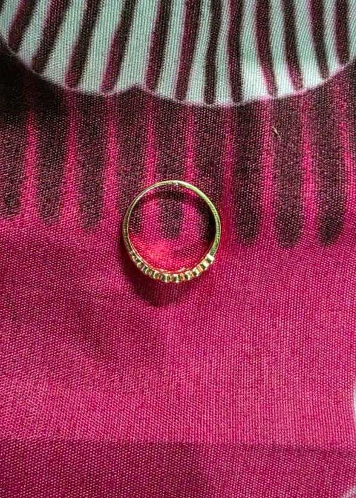Delicate Gold Ring with Subtle Embellishments
