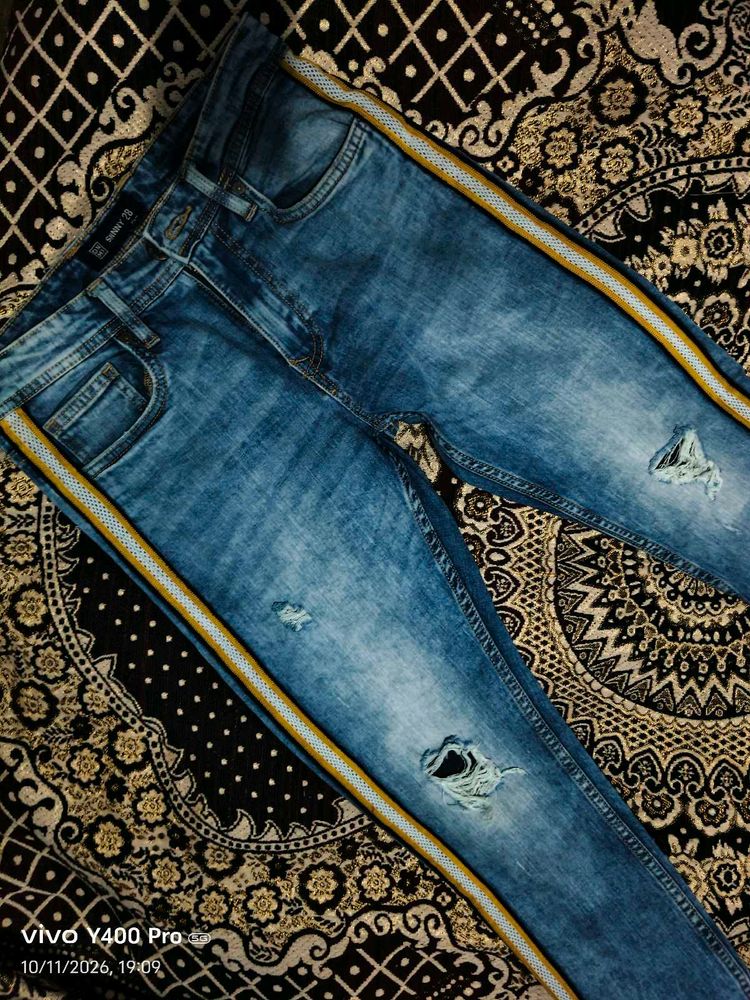 Distressed Blue Jeans with Side Stripe