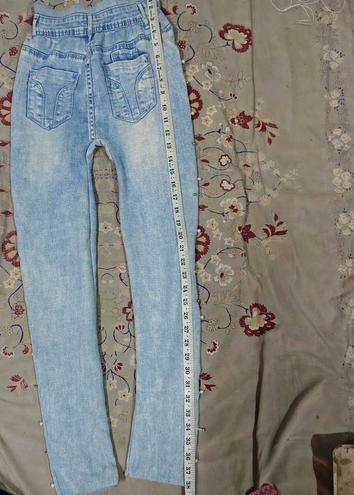 Light Wash Distressed Jeans with Pearl Detail