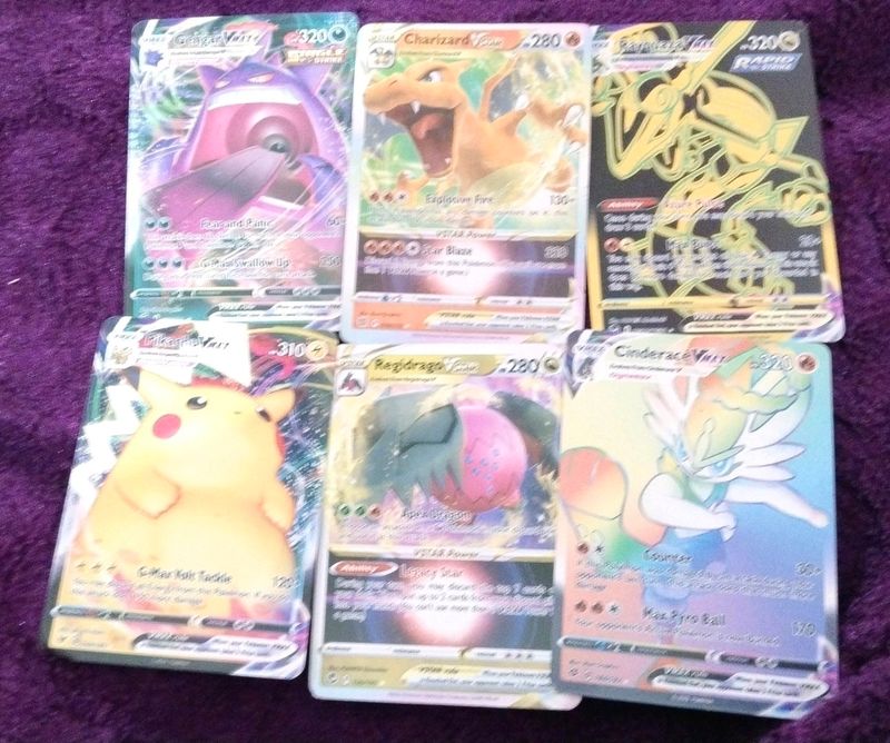 Real Pokemon cards with Vmax &amp; above are there.