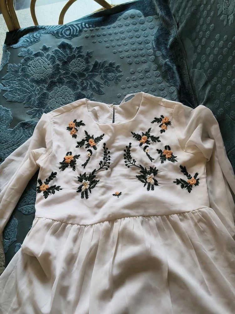Embroidered White top