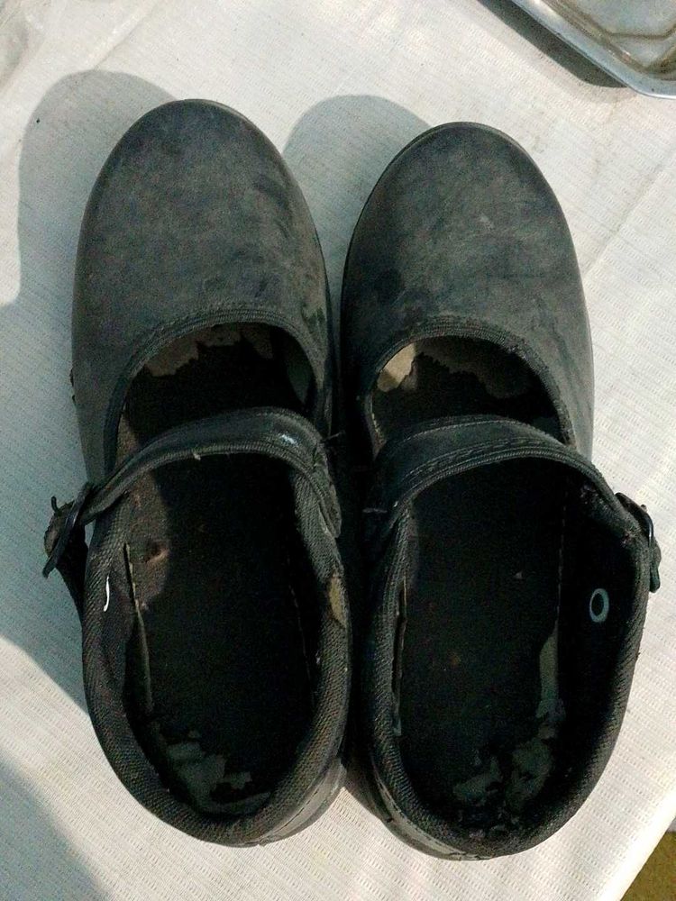 Worn Black Flats