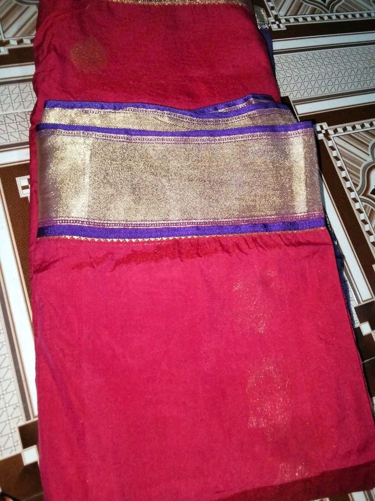 Elegant Red Saree with Gold Border