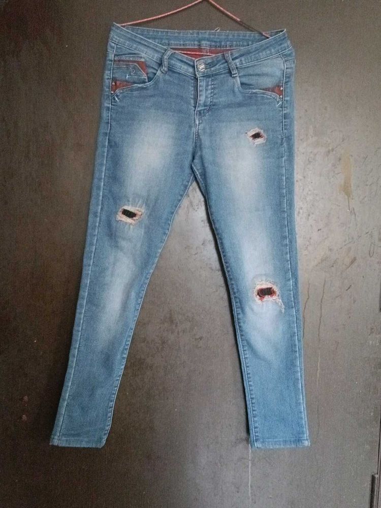 Ripped Knee Denim Jeans