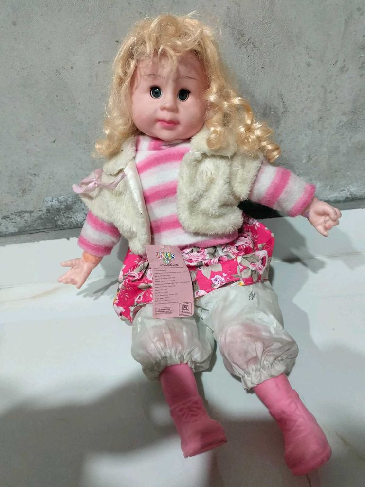 Cute Blonde Doll with Pink Outfit