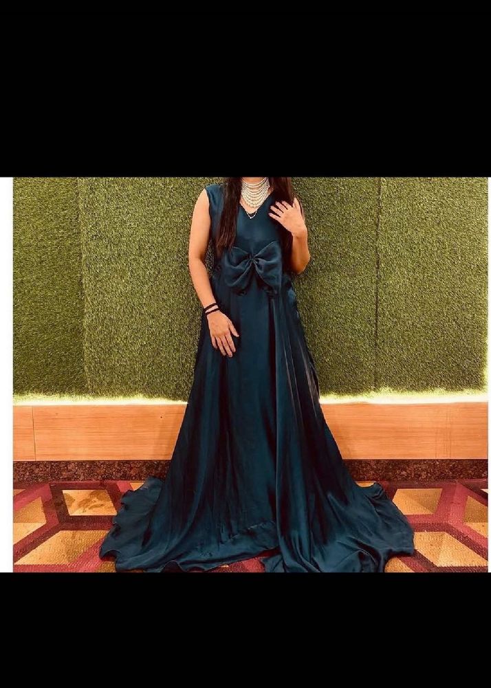 Elegant Teal Gown with Bow Detail