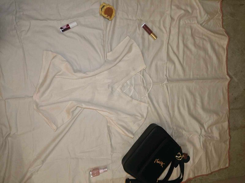 Elegant Cream Top with Cross Back Detail