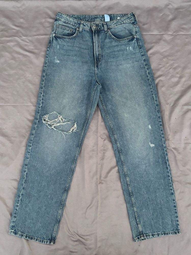 Distressed Blue Denim Jeans