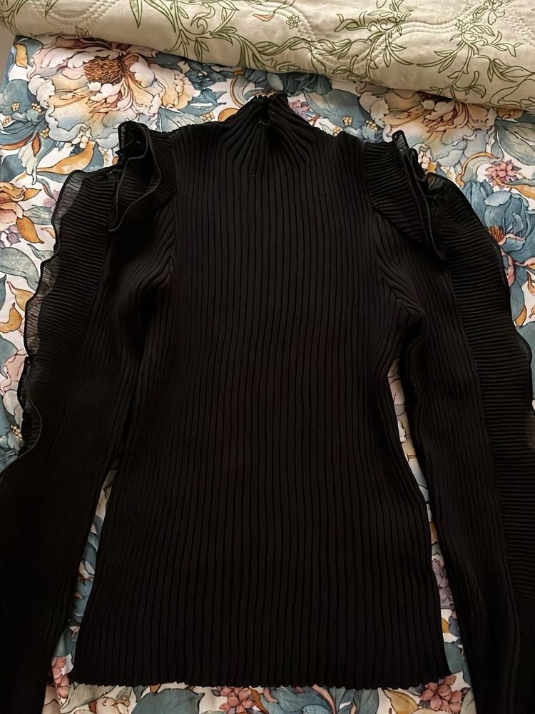 Chic Black Ribbed Mock Neck Top with Ruffle Sleeve