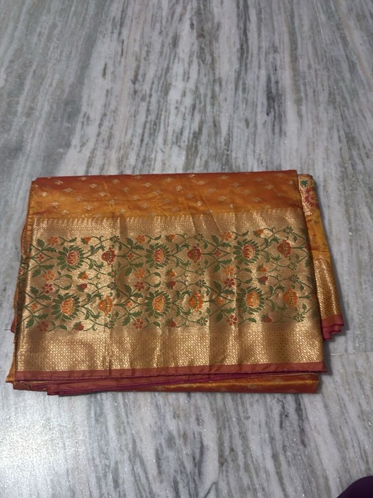 Beautifully Woven Orange Silk Saree