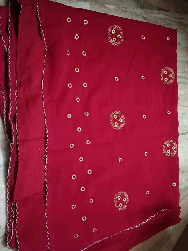 a beautiful red saree