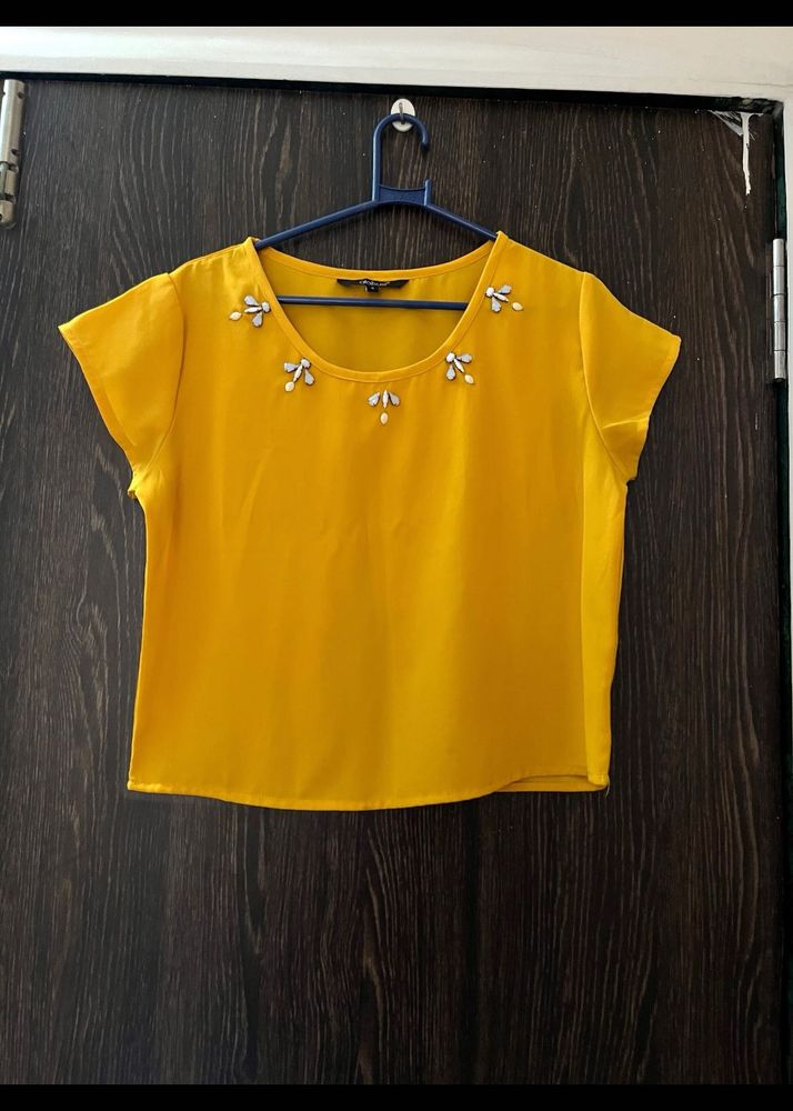 Stylish Yellow Embellished Top