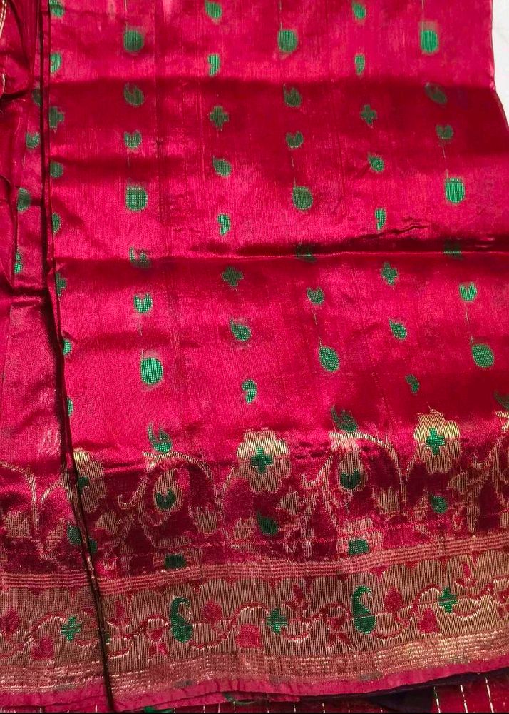 Vibrant Silk Saree with Green Motifs