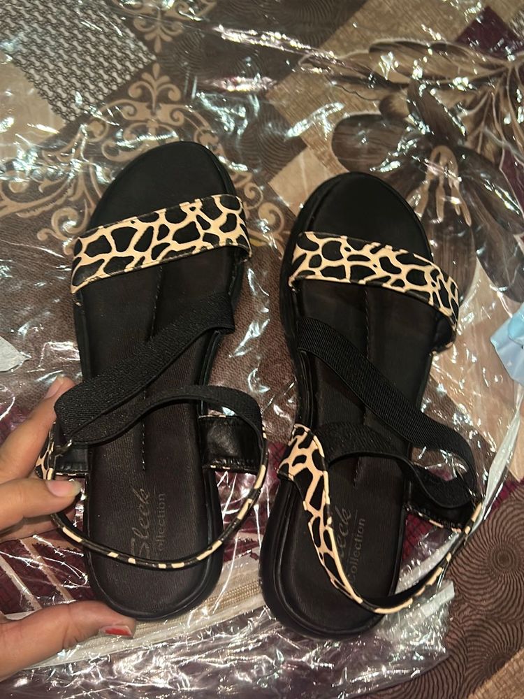 Stylish Black Sandals with Animal Print Accent