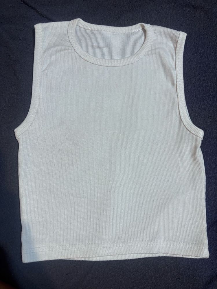 white sleeveless tank top with classic round (crew