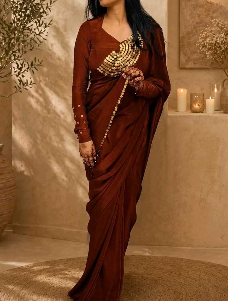 Elegant Maroon Saree with Gold Embellishments