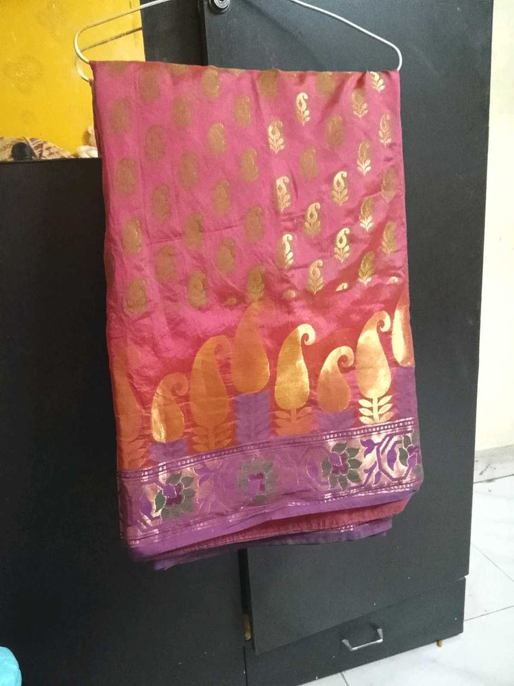 Beautiful Pink Saree with Golden Motifs