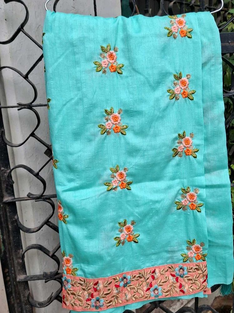 Beautifully Embroidered Teal Saree