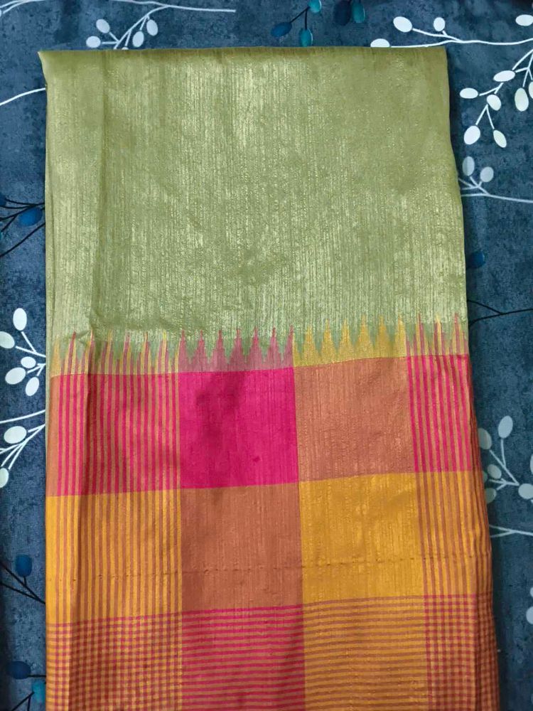 Elegant Gold Saree with detailed pink orange skirt