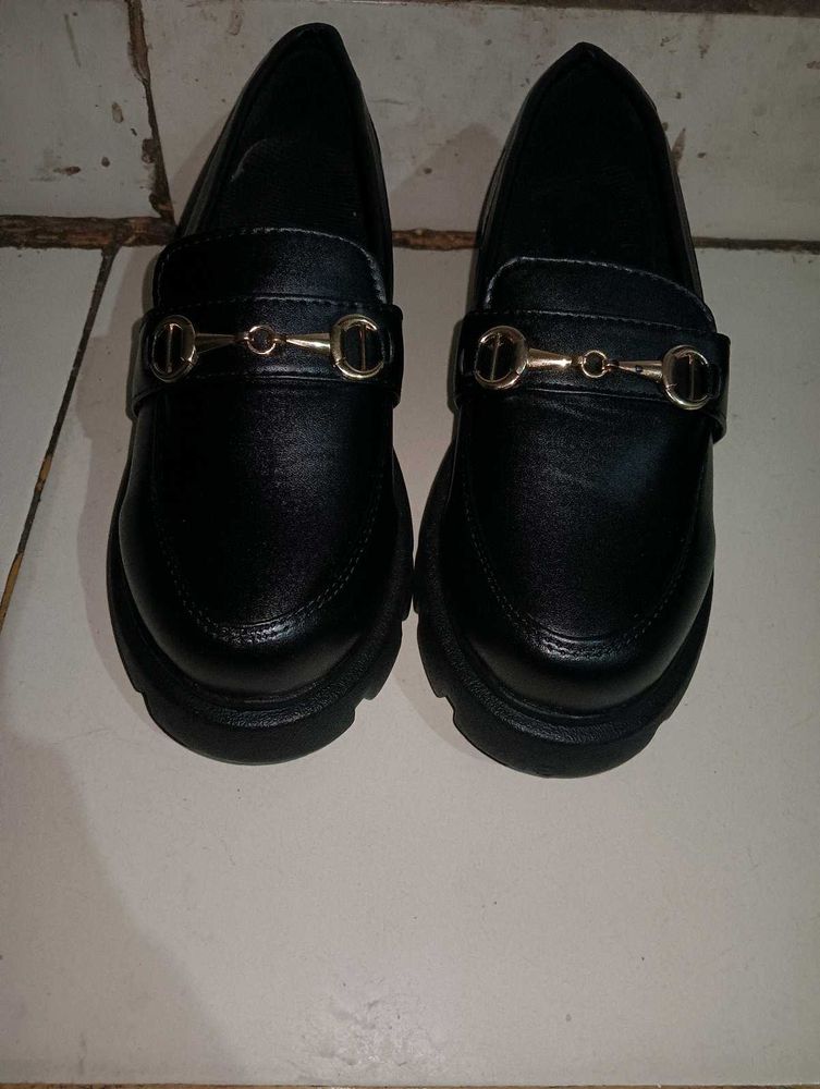Black Loafers with Gold Detail