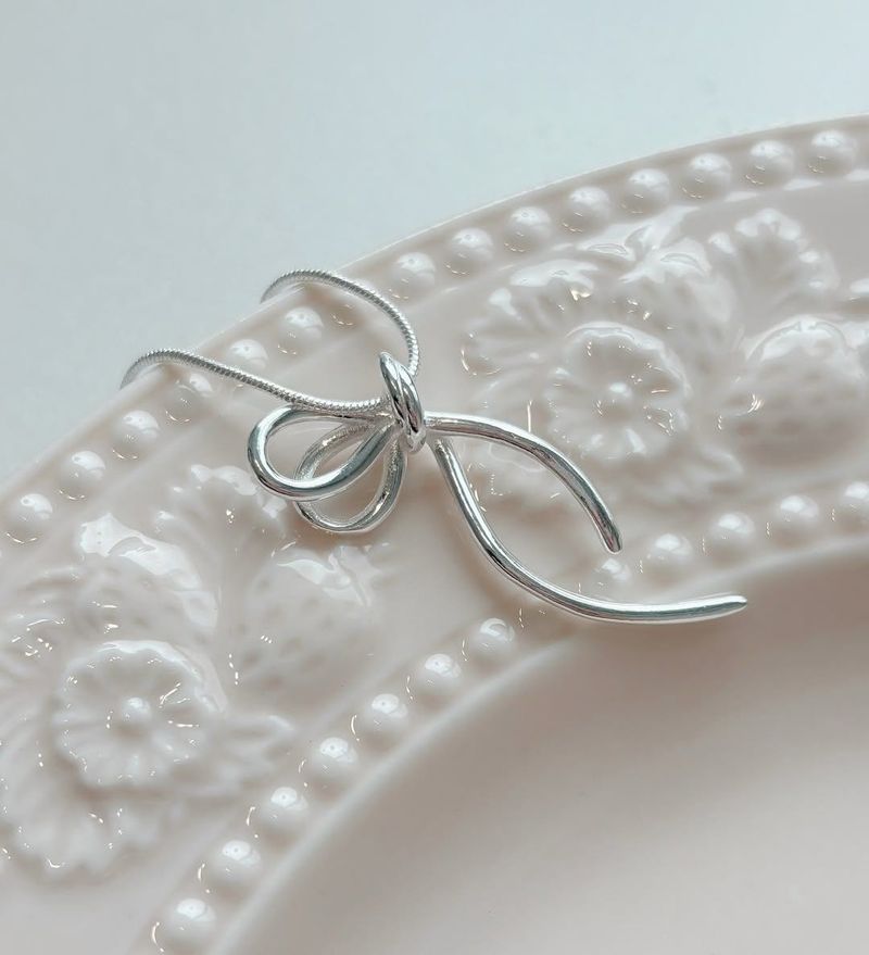 Silver Bow Pendant Necklace