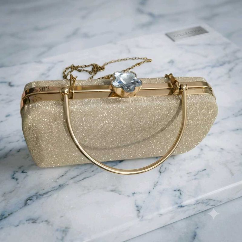 Sparkly Gold Clutch Bag with Gemstone Clasp