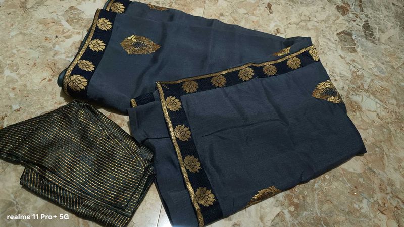 Elegant Grey Saree with Gold Border