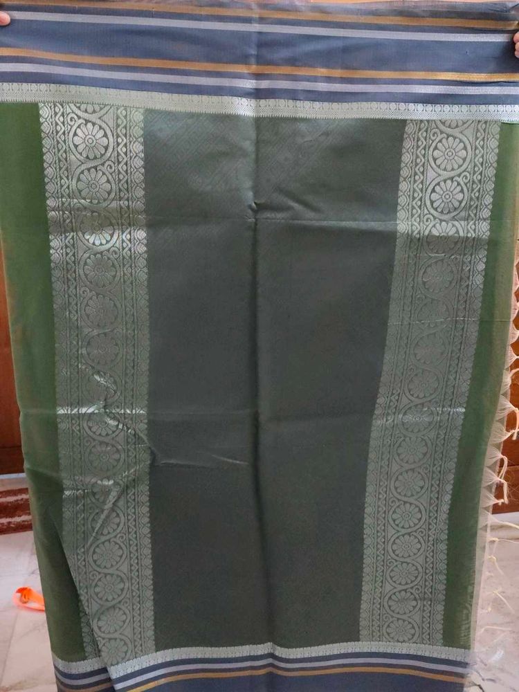 Elegant Green Saree with Silver Border