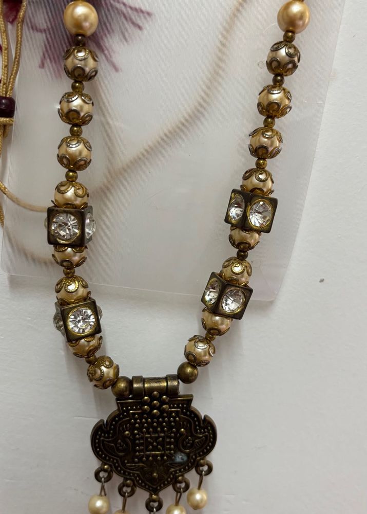 Elegant Beaded Necklace with Pendant