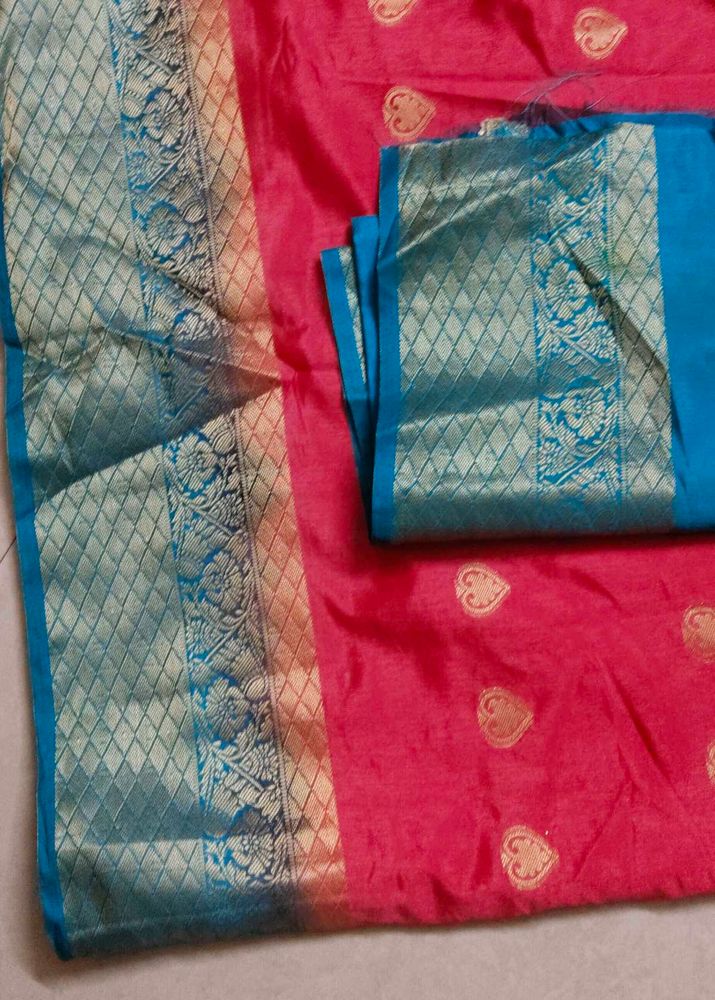 Vibrant Pink Silk Saree with Blue Border