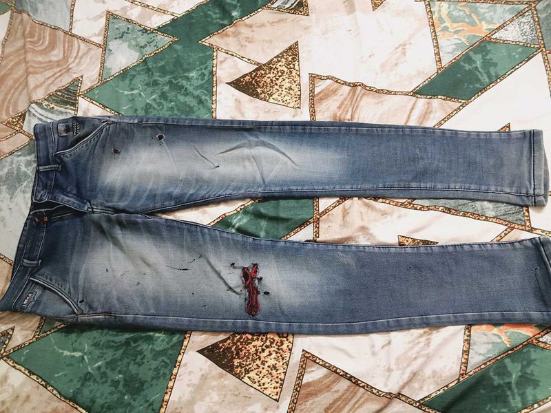 Distressed Blue Denim Jeans
