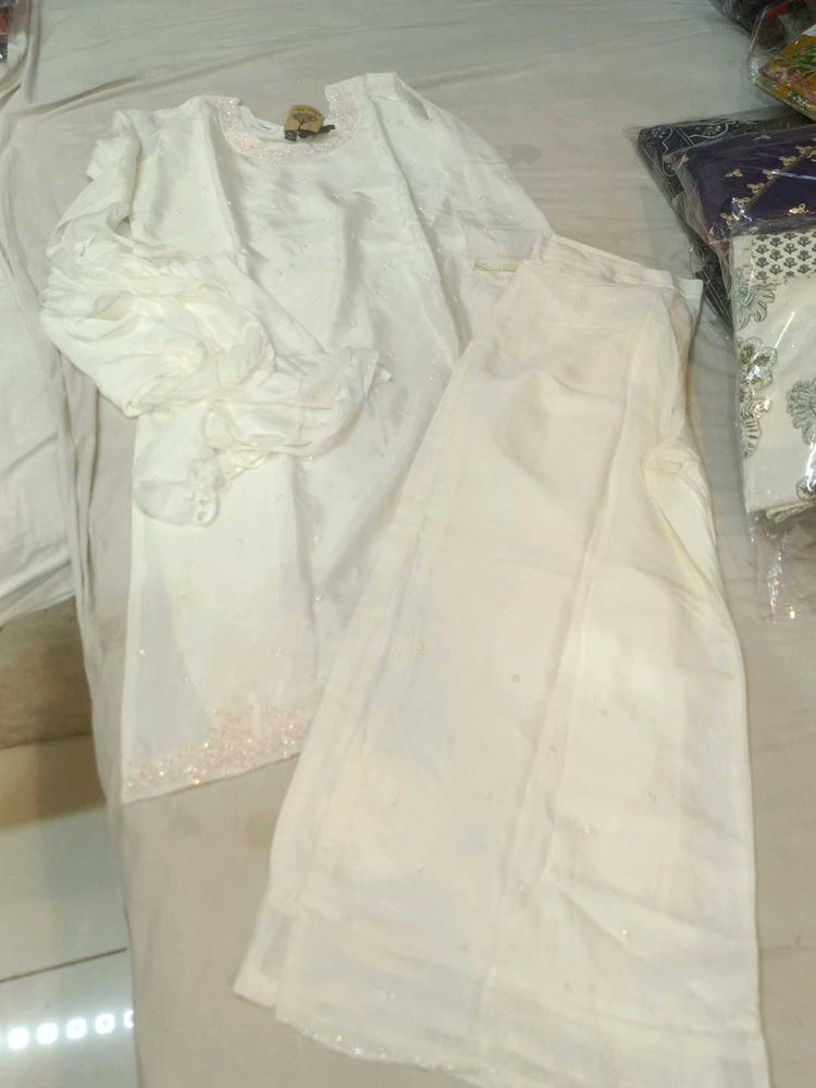 Elegant White Kurta Set with Flared Sleeves