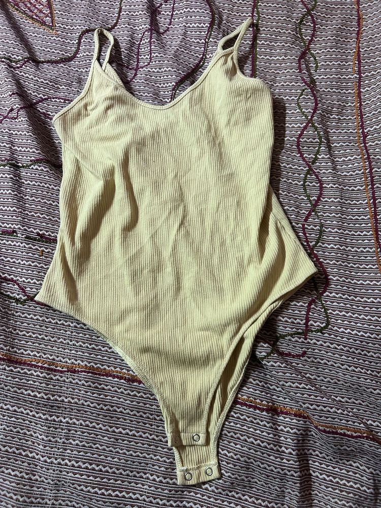 Ribbed Spaghetti Strap Bodysuit