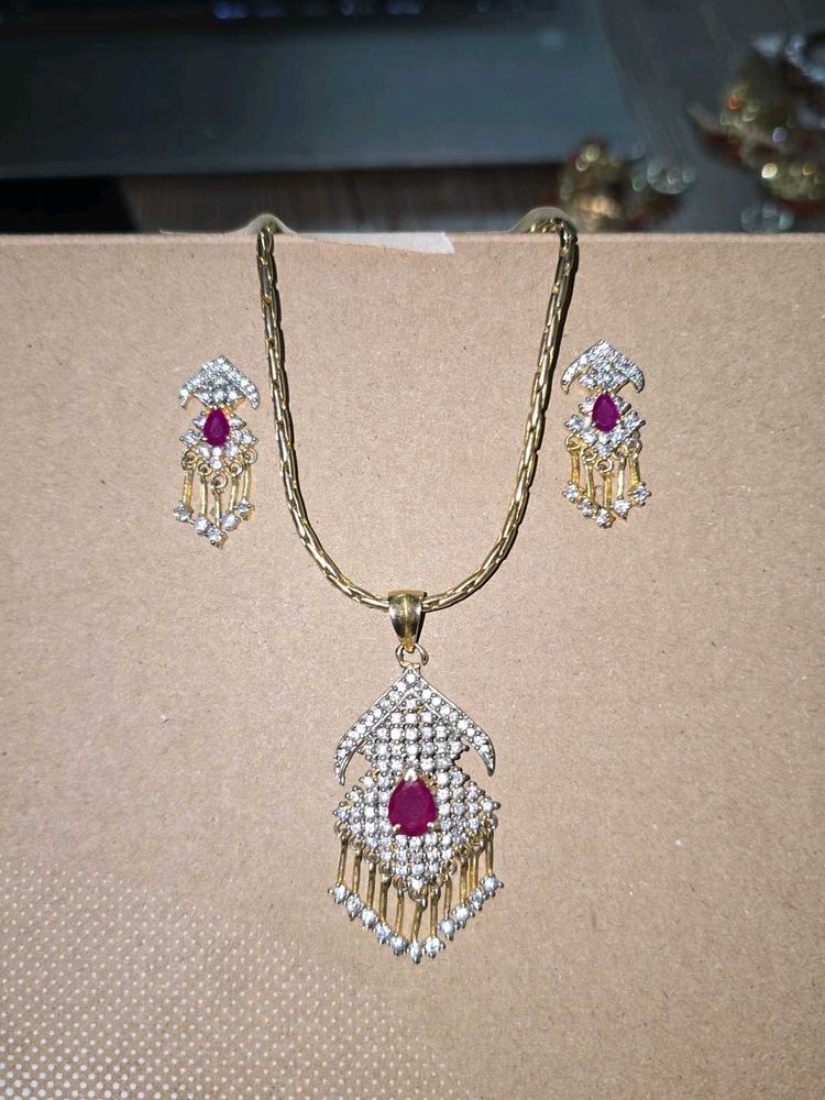 ruby and diamond pendant earrings