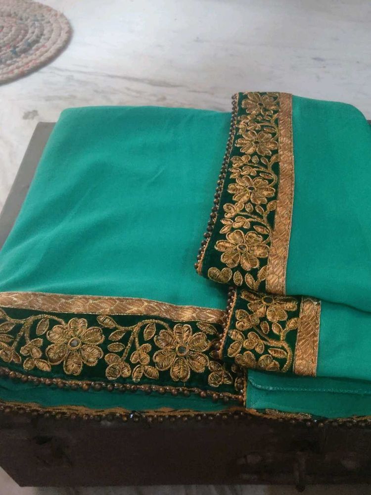 Beautiful Teal Saree with Gold Embroidery